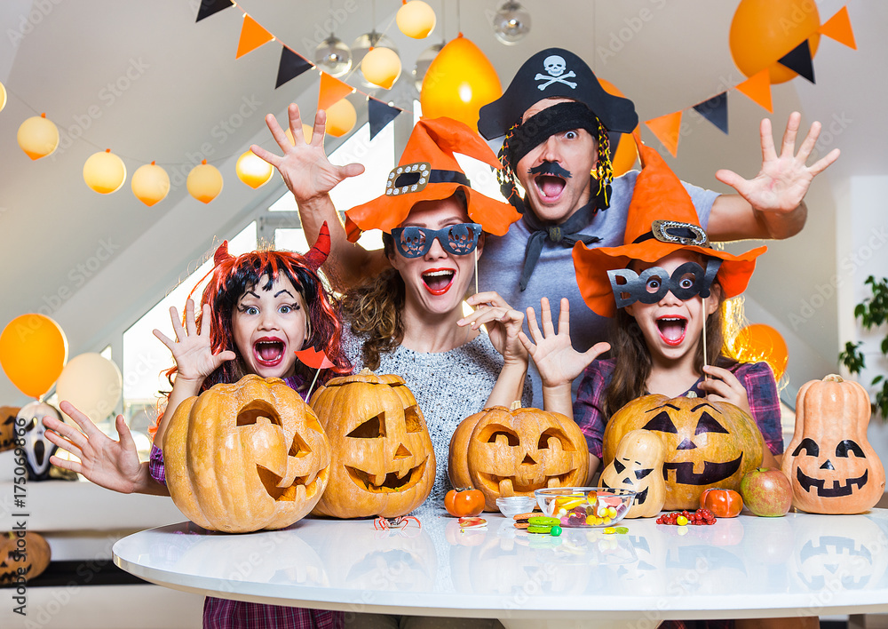 family celebrates halloween