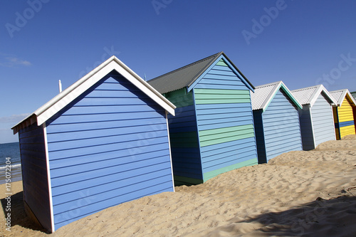 Dramatic angle of the iconic Brighton Beach Huts in Australia with beautiful blue skies