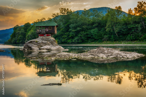Lonely house on the river Drina in Bajina Basta, Serbia photo