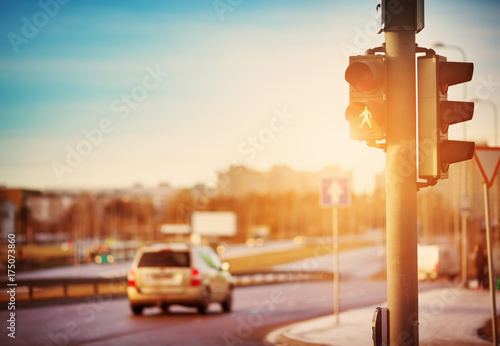 Trafficlights outdoors in early morning with green light photo