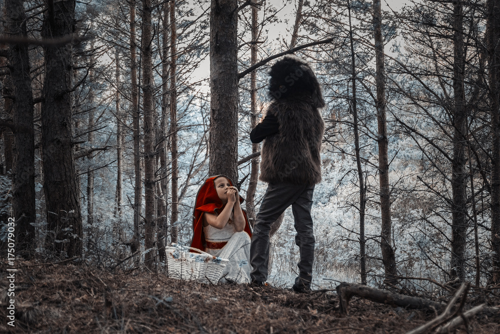 Children play in the Little Red Riding Hood and the wolf