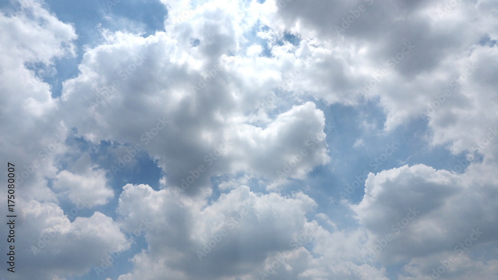 Background fluffy cloud on sky under the sun lighting Background fluffy cloud on sky under the sun lighting