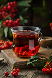hot rowanberry tea in glass cup,