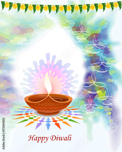 A beautiful diwali lamp made up of brown clay, hanging leaves and talisman