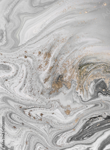 Marble abstract background with golden powder. Nature texture.