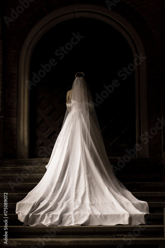 Bride in white dress. A view of the back of a bride in white dress.