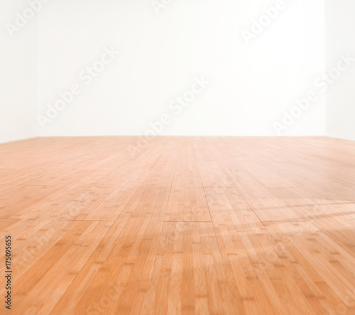 Empty room with wood flooring