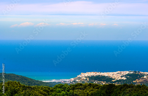 adriatic sea seascape panorama horizon with italian Peschici village in distance - Apulia - Gargano - Italy