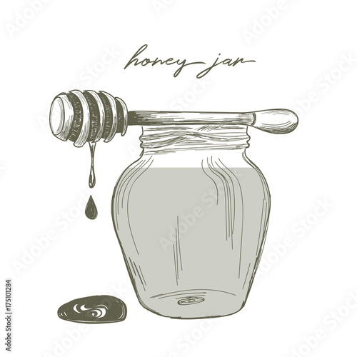 Honey jar and wooden honey dipper