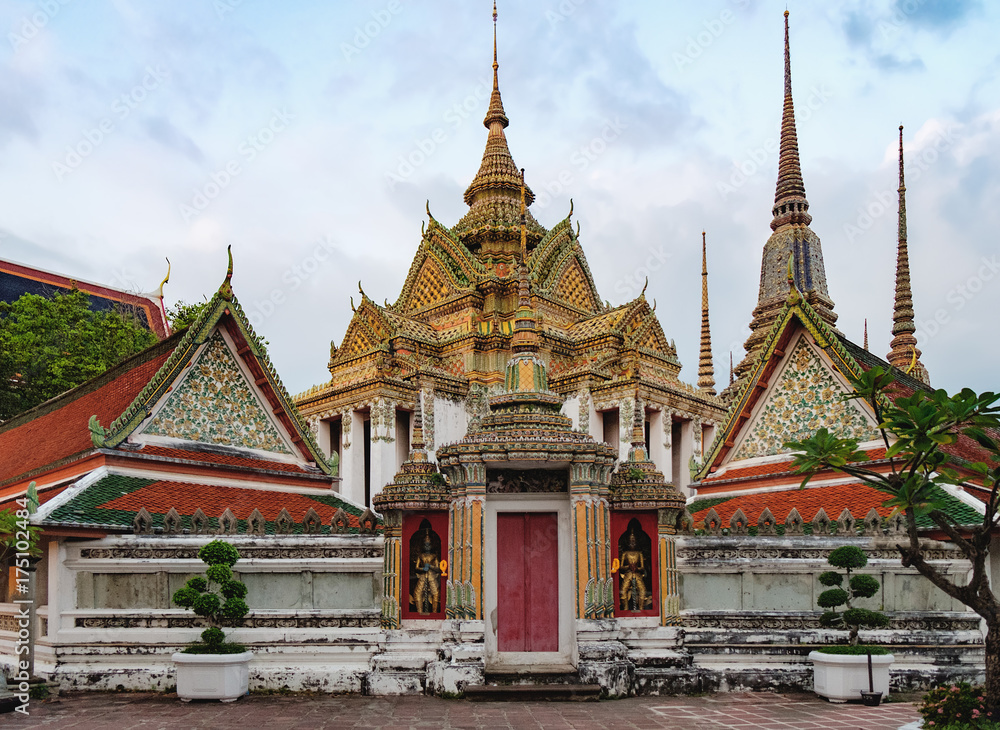 Wat Pho Temple or Temple of the Reclining Buddha is the oldest and largest Buddhist shrine in Bangkok, Thailand.
