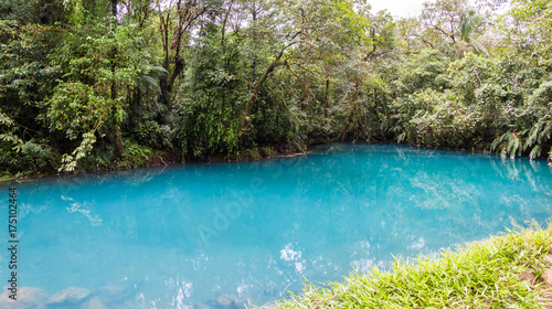 tranquil pool in the turquoise river