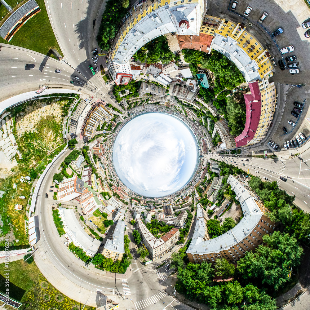 Aerial city view with crossroads and roads, houses, buildings, parks and parking lots, bridges. Helicopter drone shot. Wide Panoramic image. Aerial city view with crossroads and roads, houses, buildings, parks and parking lots, bridges. Helicopter drone shot. Wide Panoramic image.