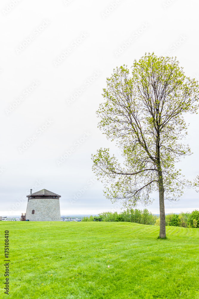 Martello tower watchtower in plaines d'Abraham with green grass field Martello tower watchtower in plaines d'Abraham with green grass field