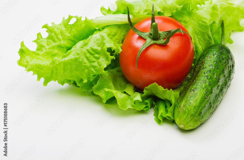 Fresh red tomatoes on lettuce leaves Fresh red tomatoes on lettuce leaves