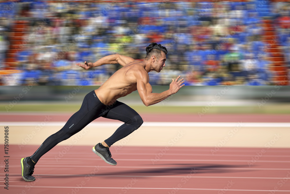 Fototapeta premium Sprinter leaving on the running track.