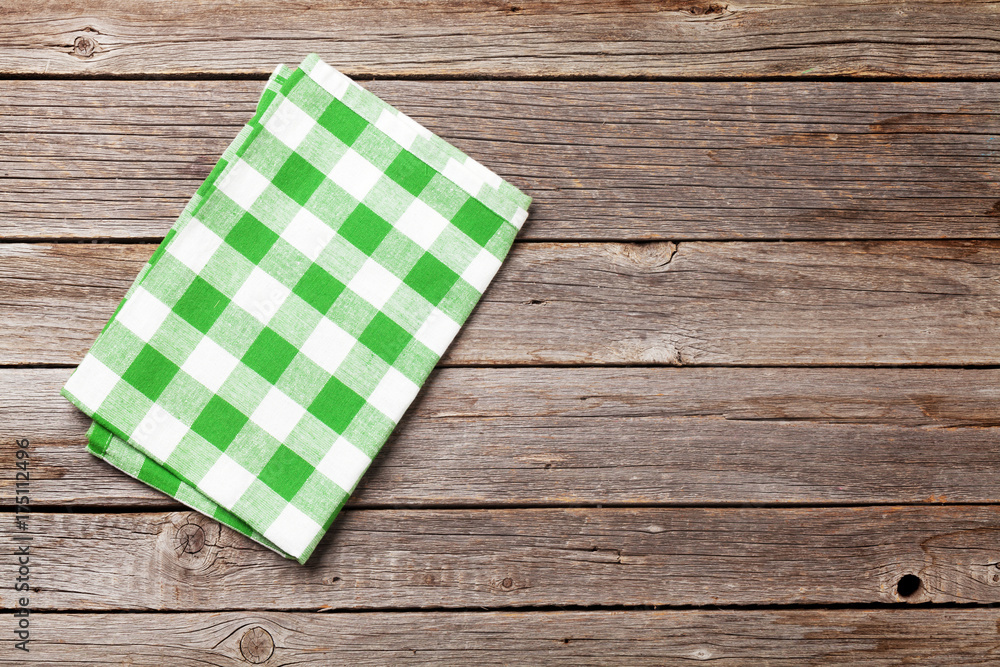 Obraz premium Kitchen towel on wooden table