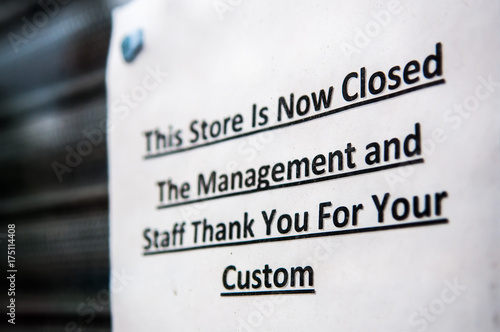 Sign advising customers that "This store is now closed. The management and Staff thank you for your custom"