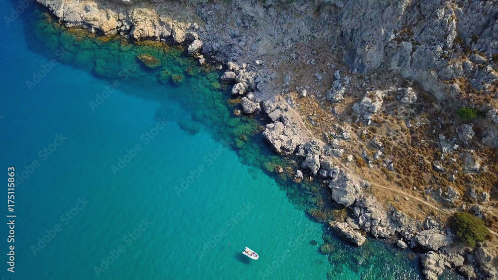 Aerial View: Drone video of iconic beach of Agathi and castle of Feraklos, Rodos island, Aegean, Greece