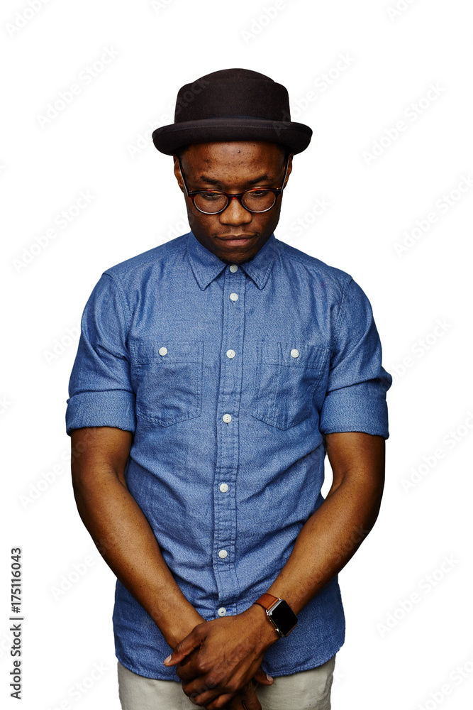 attractive young black male studio with hat looking down arms over attractive young black male studio with hat looking down arms over