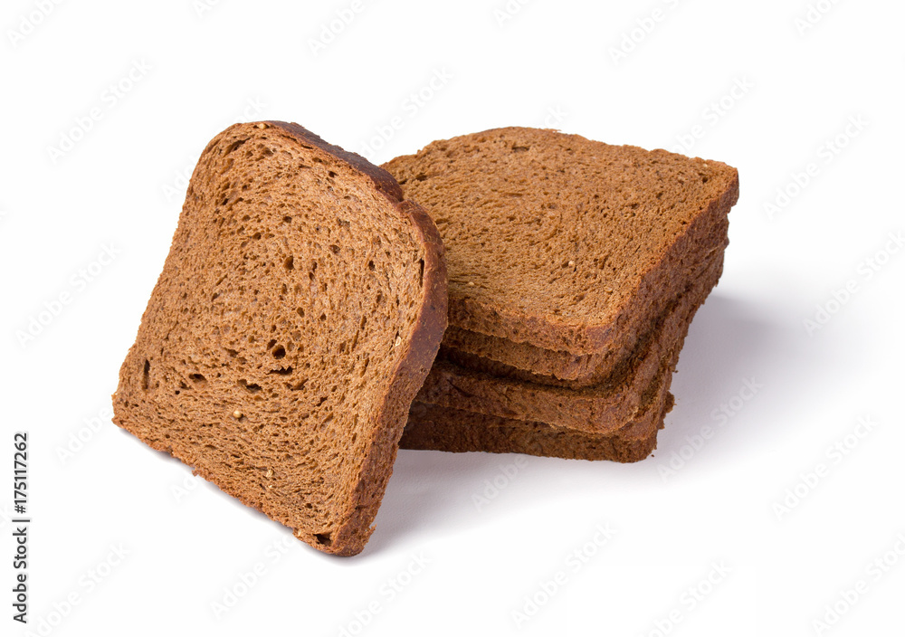 Pile Brown bread toast isolated over white. Low-calorie grain bread. Pile Brown bread toast isolated over white. Low-calorie grain bread.