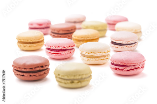 Assortment of colourful macaroons on white background