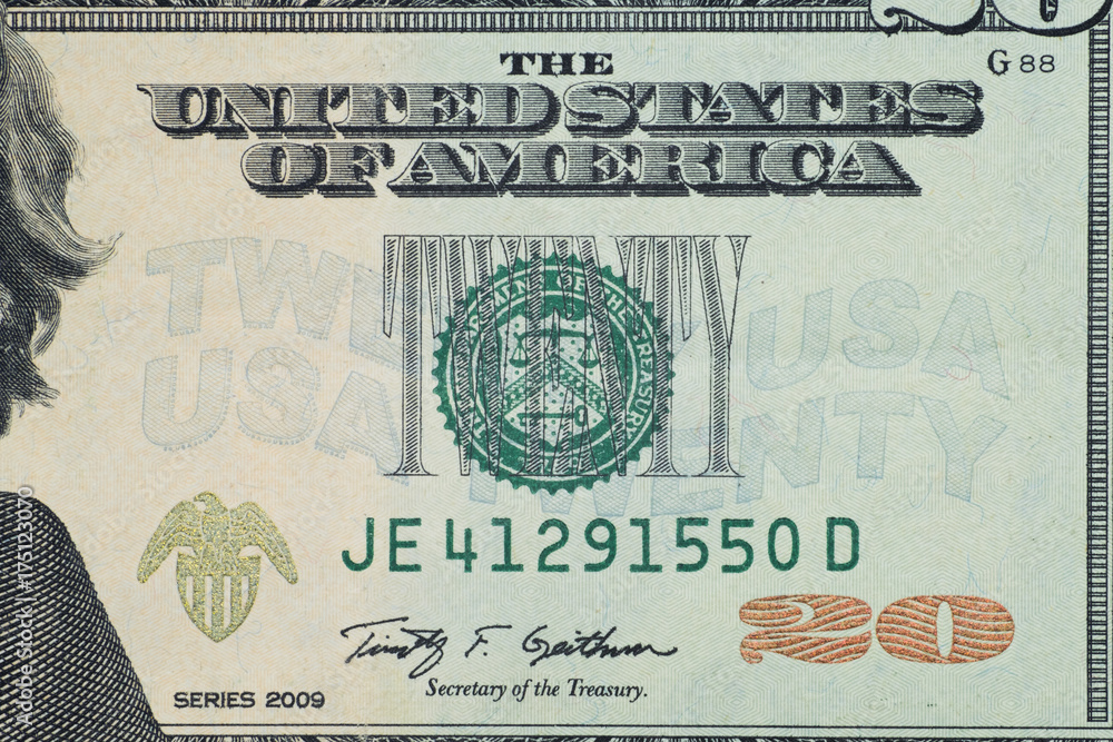 Close up on US dollar banknotes. U.S. Federal reserve system on US Dollar banknotes. Shooting by 1:1 Macro lense. Close up on US dollar banknotes. U.S. Federal reserve system on US Dollar banknotes. Shooting by 1:1 Macro lense.