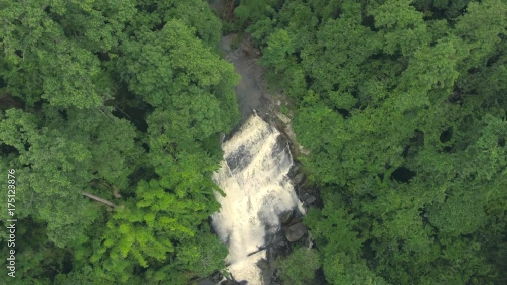 aerial shot of big waterfall in jungle aerial shot of big waterfall in jungle