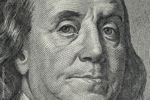 Close up on US dollar banknotes.  Portrait of Franklin on US dollar Banknotes. Shooting by 1:1 Macro lense.
