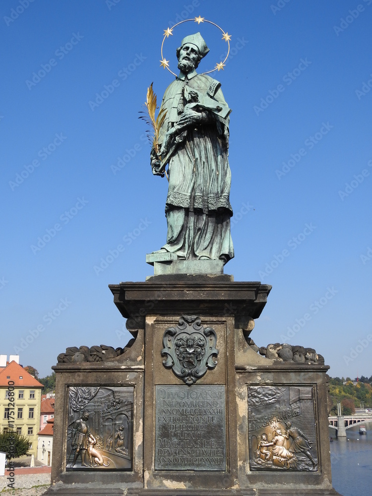 Obraz premium Statue of Saint John of Nepomuk (Jan Nepomucký, John Nepomucene) on the Charles Bridge (Karlův most), city of Prague (Praha), Czech Republic (Česká republika)