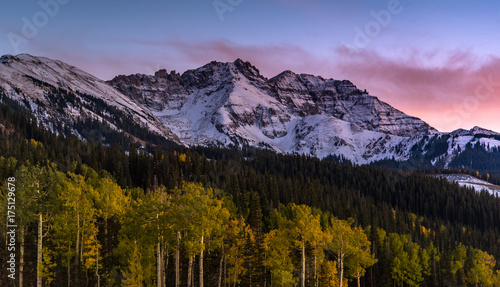 Sunset over Autumn forest with mountain background in Telluride
