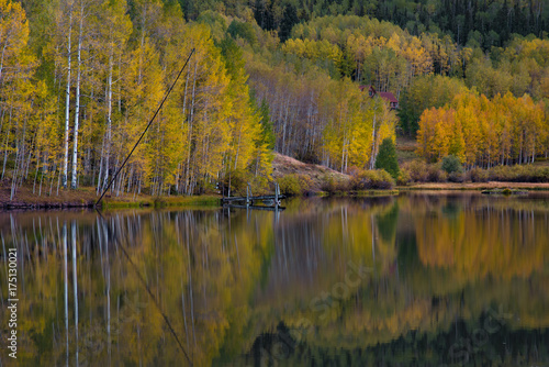 Autumn in Telluride with snow on the mountain with reflection in the lake