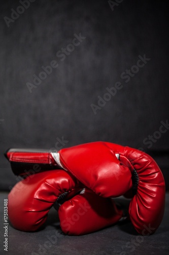 Boxing gloves in fitness studio © wavebreak3