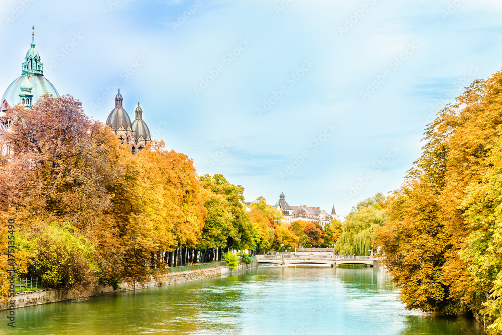 View on colorful trees at the Isar in Autumn in Munich
