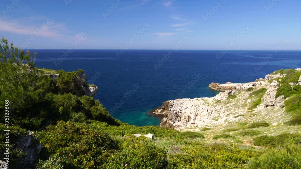 Scenic coastal cliffs near blue ocean, wide Scenic coastal cliffs near blue ocean, wide