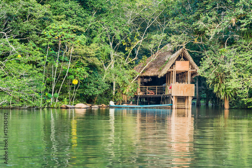 Wooden treehouse style cabin in the jungle