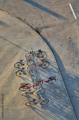 Bicycles stand on a street