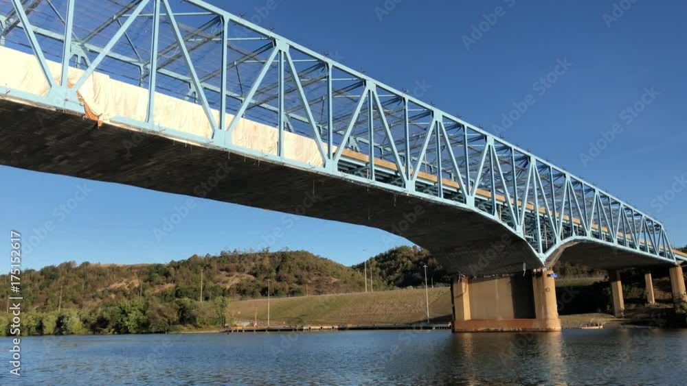 Traveling under a bridge that is under repair on the Ohio River. Traveling under a bridge that is under repair on the Ohio River.