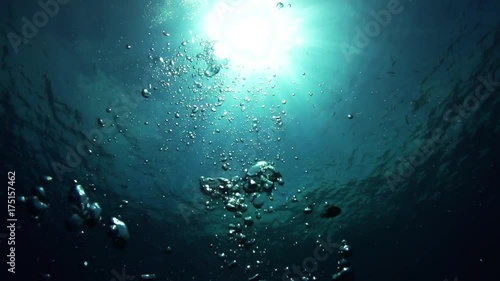 Slow motion, Bubbles rise in tropical ocean