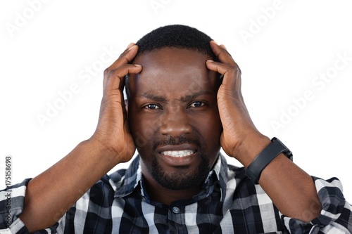 Confused man against white background