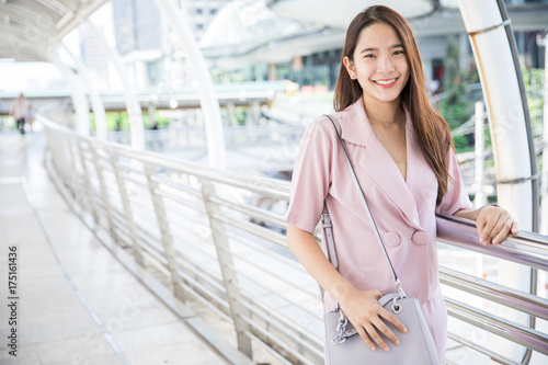 Young asian businesswoman outdoors Free Download Young asian businesswoman outdoors - GFXLoad