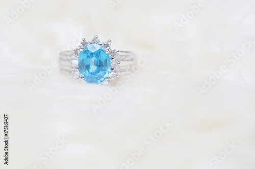 diamond ring and blue gemstone