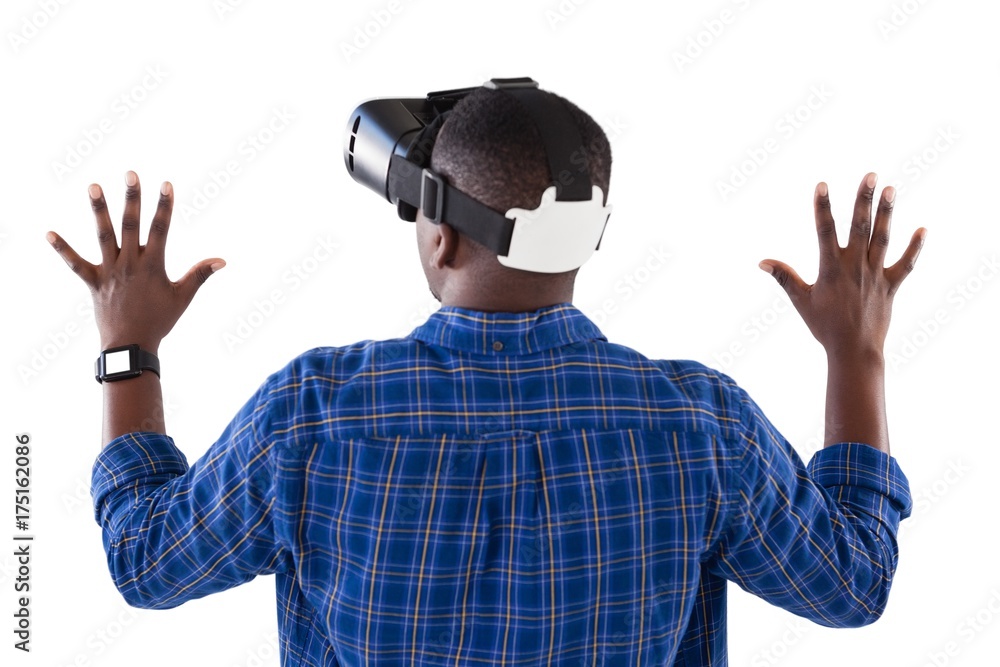 Man gesturing while using virtual reality headset Man gesturing while using virtual reality headset