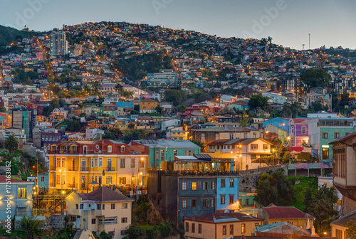 View over one of the hills of Valparaiso in Chile at dusk photo