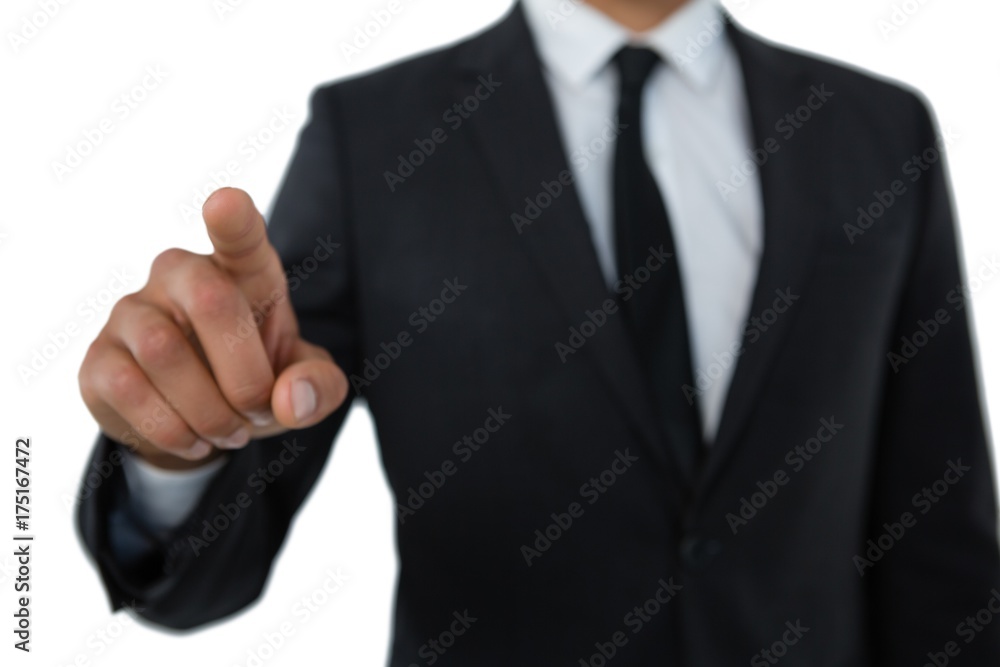 Mid section of businessman with pointing gesture Mid section of businessman with pointing gesture