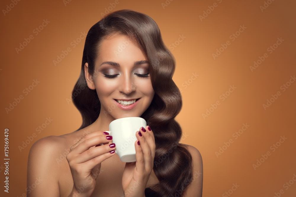 Portrait of beautiful woman drinking coffee on brown background. Portrait of beautiful woman drinking coffee on brown background.