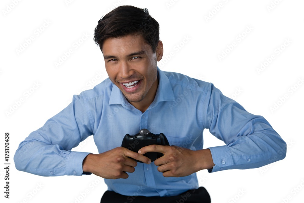 Portrait of happy businessman playing video game Portrait of happy businessman playing video game