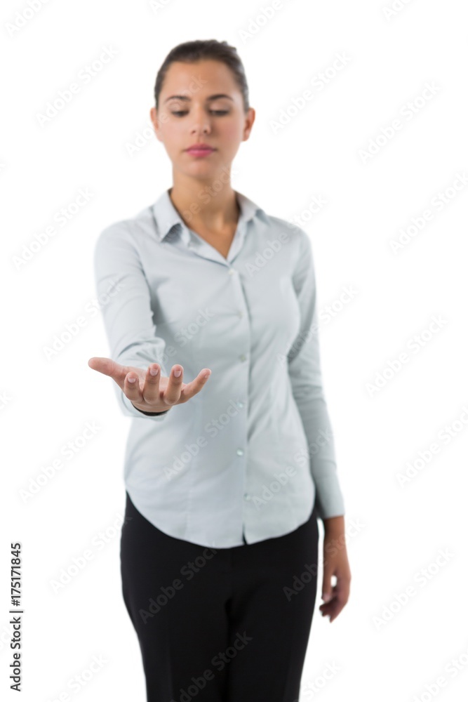 Female executive holding invisible object Female executive holding invisible object