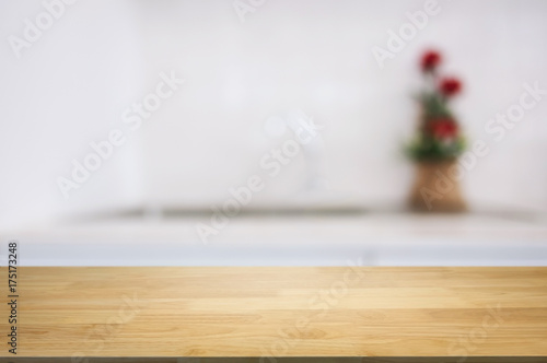 empty wood table over blurred kitchen background