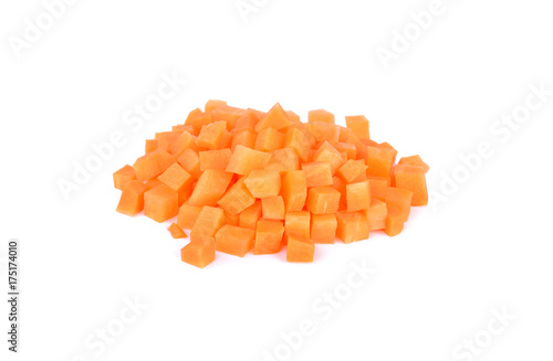 pile of fresh portion cut carrot cube on white background