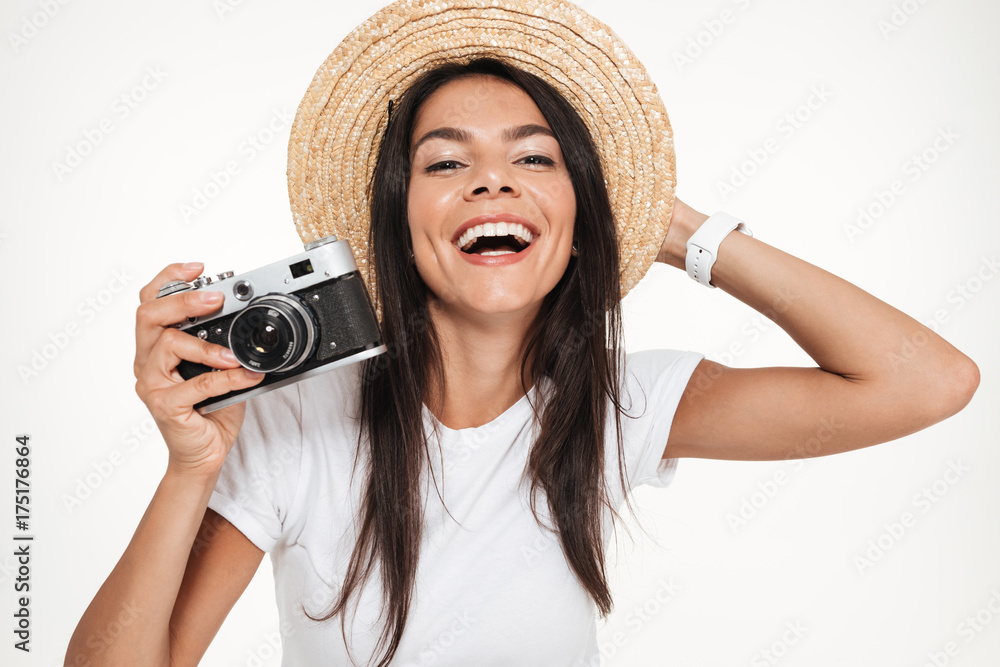 Close up portrait of a happy woman in hat posing